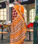 Red printed cotton saree with blouse piece