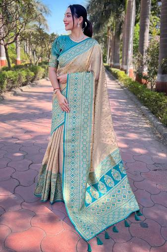 Beige zari woven pure tissue women's saree with blouse piece