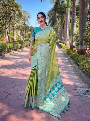 Green zari woven pure tissue women's saree with blouse piece 1