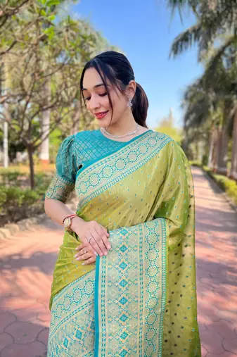 Green zari woven pure tissue women's saree with blouse piece
