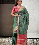 Green patola silk saree with unstitched blouse piece
