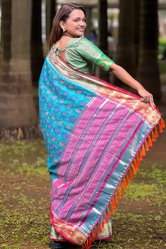 Blue patola silk saree with unstitched blouse piece
