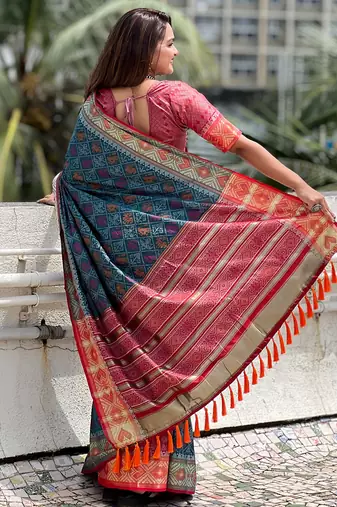 Teal patola silk saree with unstitched blouse piece