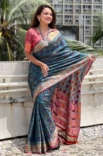Teal patola silk saree with unstitched blouse piece