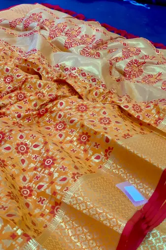 Orange pure patola silk saree and unstitched blouse piece