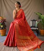 Red pure patola silk saree and unstitched blouse piece