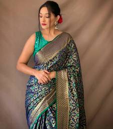 Dark blue pure patola silk saree and unstitched blouse piece