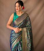 Dark blue pure patola silk saree and unstitched blouse piece