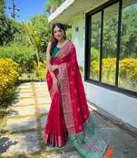 Pink patola silk saree and has a  zari border blouse piece