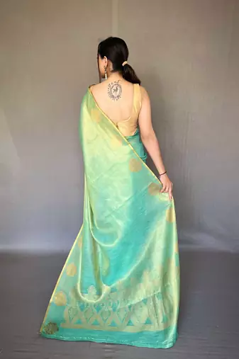 Teal tissue silk saree with unstitched blouse piece