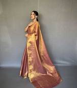 Peach tissue silk saree with unstitched blouse piece
