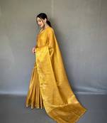Yellow tissue silk saree with unstitched blouse piece