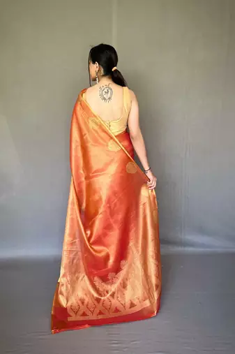 Red tissue silk saree with unstitched blouse piece