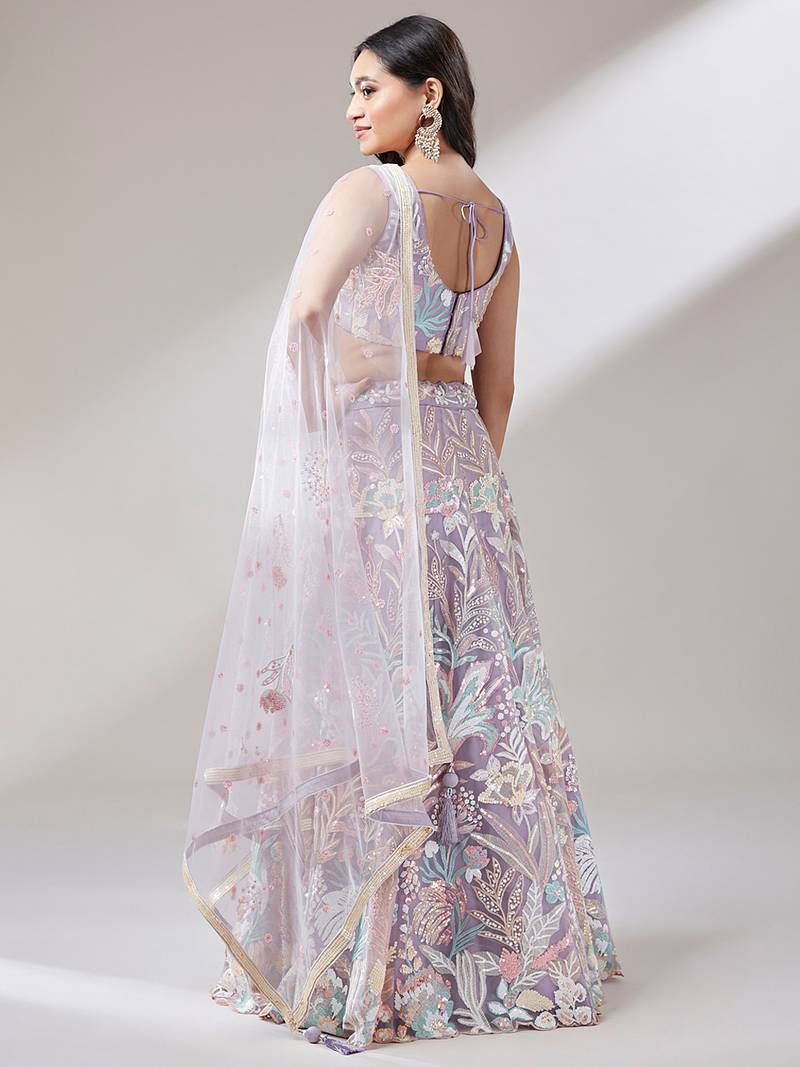 Captivating Lavender Sequins Soft Net Reception Wear Lehenga Choli