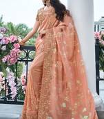 Salmon pure tissue silk heavy thread embroidery work on border with zari weaving saree with blouse