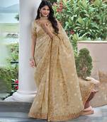 Beige pure tissue silk heavy thread embroidery work on border with zari weaving saree with blouse