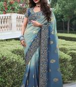 Sky blue pure tissue silk heavy thread embroidery work on border with zari weaving saree with blouse