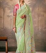 Pista green silk jacquard woven saree with blouse
