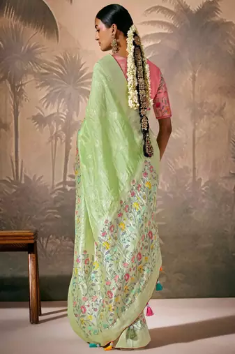 Pista green silk jacquard woven saree with blouse