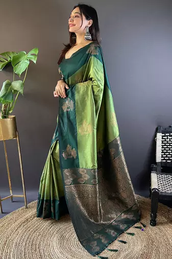 Green soft silk saree with unstitched blouse piece