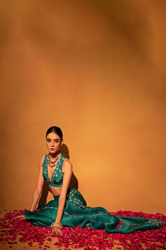 Teal green organza saree