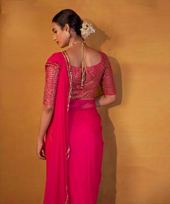 Hot pink net saree with belt 2