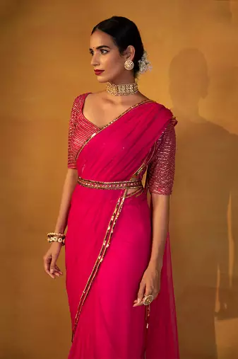 Hot pink net saree with belt