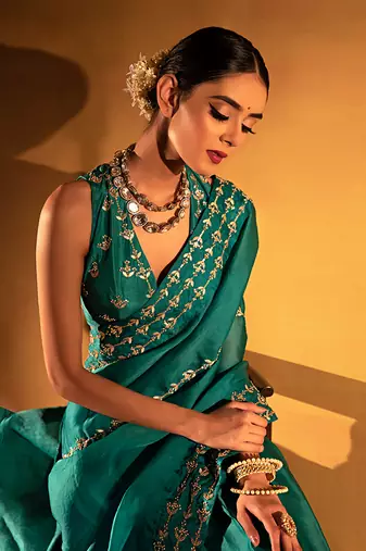 Teal green organza saree