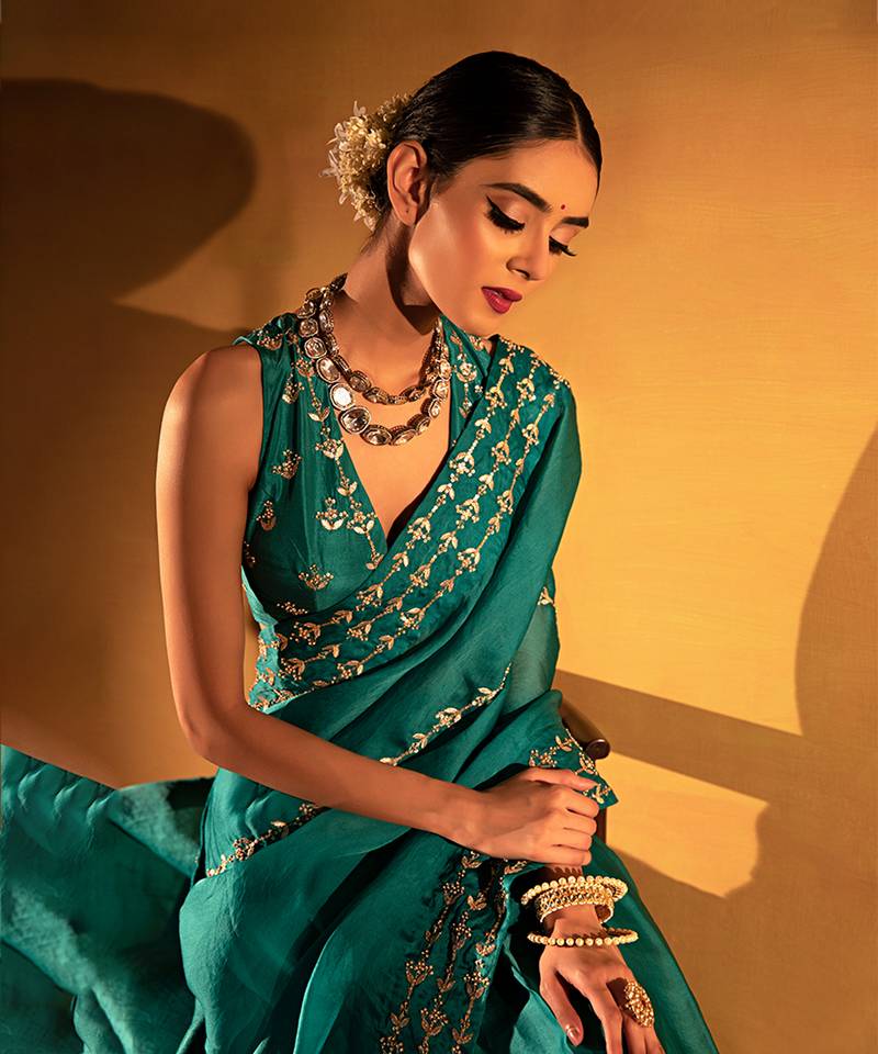 Teal green organza saree