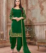 Green embroidered art silk semi-stitched straight churidaar.(size up to 42")