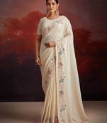 Elegant white georgette saree with sequins zarkan