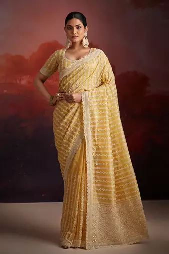 Graceful mustard organza saree with zarkan details