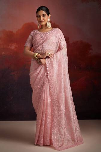 Peach designer organza saree with intricate work