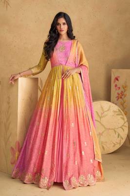 Multi embroidered silk free sizestitched gown.(size Free size full stitched Up To 42") 1