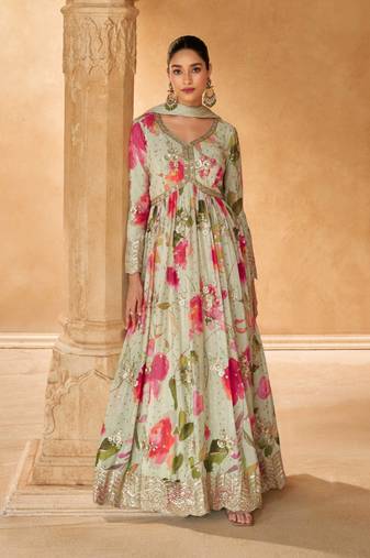 Off white embroidered silk free size stitched gown.(size Free size full stitched Up To 42")