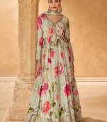 Off white embroidered silk free size stitched gown.(size Free size full stitched Up To 42")