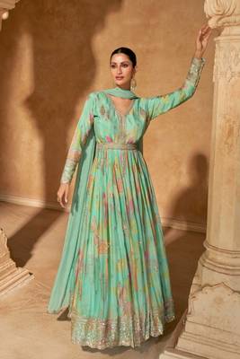 Turquoise embroidered silk free size stitched gown.(size Free size full stitched Up To 42") 1