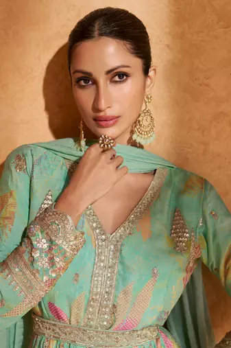 Turquoise embroidered silk free size stitched gown.(size Free size full stitched Up To 42")