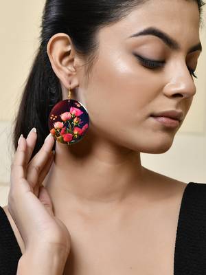 Floral round earrings with vibrant pink roses and butterflies 1