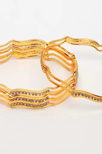  women's set of 4 gold-plated cubic zirconia stone studded bangles