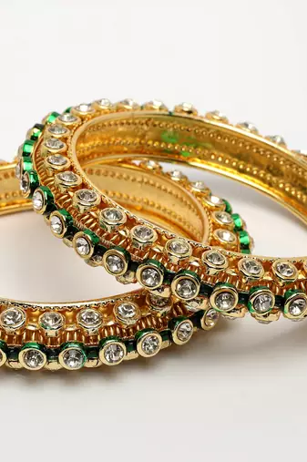 gold brass bangles with kundan studded work