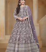 Purple net heavy thread embroidery with sequins work salwar kameez