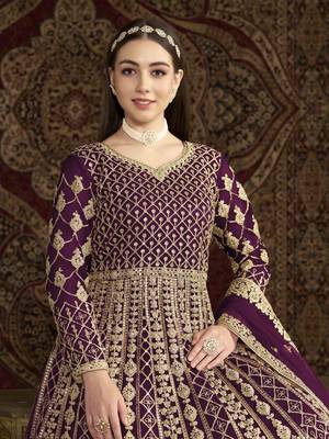 Purple net heavy thread embroidery with sequis work salwar kameez 4