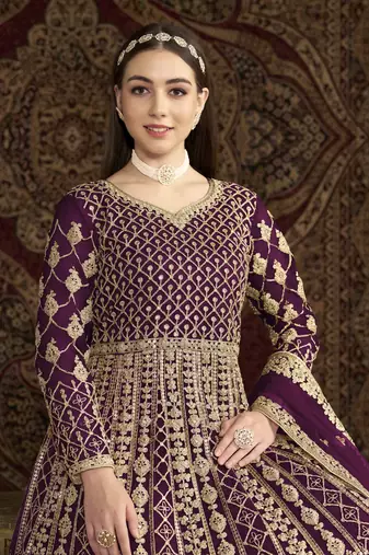 Purple net heavy thread embroidery with sequis work salwar kameez