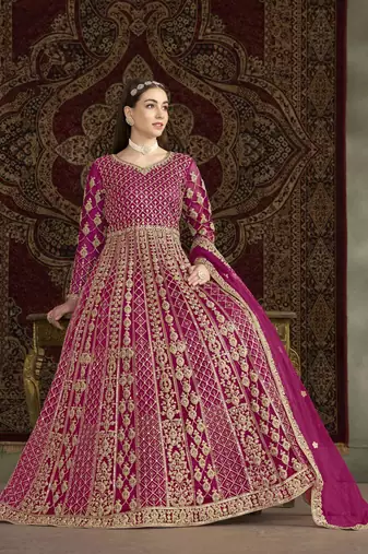Hot pink net heavy thread embroidery with sequis work salwar kameez