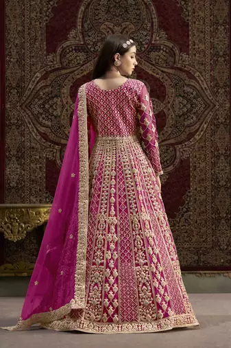 Hot pink net heavy thread embroidery with sequis work salwar kameez