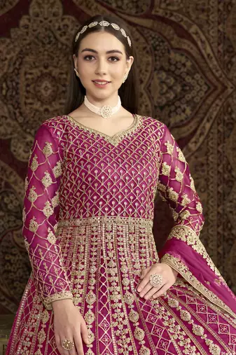 Hot pink net heavy thread embroidery with sequis work salwar kameez