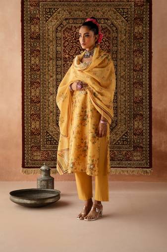 Yellow chanderi  embroidery suit set with gota patti work on neck and mirror work overall