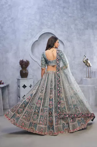 Organza Silk Intricate Paisley Motifs Traditional Embroidered Wedding Lehenga Choli With Soft Net Dupatta