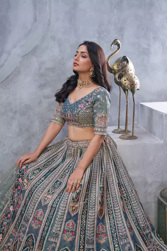Organza Silk Intricate Paisley Motifs Traditional Embroidered Wedding Lehenga Choli With Soft Net Dupatta